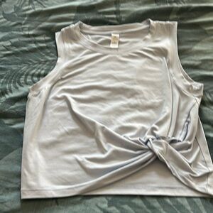 Trendy crop top by Yogolicious, baby blue never worn.